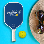 Funny Pickleball Y'all Custom Text Name Pickleball Paddle<br><div class="desc">Laten we allemaal pickleball spelen. Deze grappige paddle op de pickleball staat "pickleball y'all" in een gewaagde witte tekst die tegen een blauwe achtergrond is geplaatst en gemarkeerd door een gele pickleball (u kunt de achtergrondkleur eenvoudig wijzigen). Voeg 2 lijnen van douanetekst toe om te personaliseren - de clubnaam, de...</div>