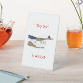 Funny roadrunner bird cartoon illustration reclamebord met voetstuk (Insitu)