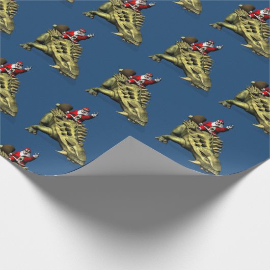 Funny Santa Claus die op Talarurus rijdt Cadeaupapier (Hoek)