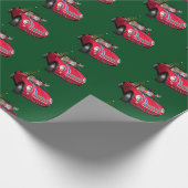 Funny Santa Claus rijdt een mini Cadeaupapier (Hoek)