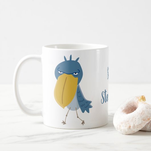 Funny Shoebill Stop met het staren van koffie Mok (Met donut)