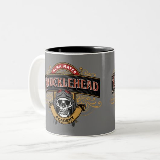Funny Skull Knucklehead Academy Tweekleurige Koffiemok (Voorkant links)