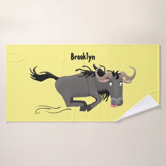 Funny wildebeest die de illustratie van de cartoon bad handdoek (Badhanddoek)