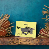 Funny wildebeest die de illustratie van de cartoon fotoplaat (Zijkant)