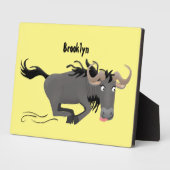 Funny wildebeest die de illustratie van de cartoon fotoplaat (Zijkant)