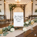 Funny "You Survived the Ceremony" Minimalist Weddi Kaart<br><div class="desc">Add a touch of humor to your wedding reception with this witty table number card! Featuring the playful phrase "You Survived the Ceremony! Please take a seat at, " this minimalist design uses elegant black script calligraphy on a crisp white background. It's the perfect icebreaker for your guests. Easily personalize...</div>