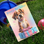 Furry Friends Boxer Puppy en cadeaus Verjaardag Kaart<br><div class="desc">Maak hun speciale dag onvergetelijk met onze schattige Boxer Puppy-thema verjaardagskaart! Deze leuke en levendige kaart is voorzien van een schattige Boxer puppy zittend bovenop een stapel roze en blauwe geschenkdozen met een pastelroze, blauwe en gele kleur wasachtergrond. Het is de perfecte manier om een glimlach op hun gezicht te...</div>