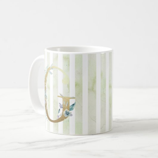 G gouden initiaal op blauwe en witte strepen koffiemok (Voorkant links)