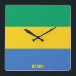 Gabon National Flag Patriotic Vierkante Klok<br><div class="desc">Gabon National Flag Patriotic Square Wall Clock met de landvlag in de nationale kleuren die de hele tijd worden gedrukt. De naam van het land is subtiel geïntegreerd in het ontwerp onderaan. De tekst kan volledig worden aangepast met de functie "Aanpassen!". Dit charmerende ontwerp is het verbluffende geschenk en het...</div>