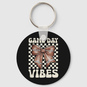 Game Day Vibes Groovy Coquette Bow Football Vrouwe Sleutelhanger