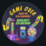 Gaming en Arcade Birthday Hartelijk dank Ronde Sticker<br><div class="desc">GAME OVER! Bedankt dat je gasten je arcade hebben bijgewoond. Deze sticker bevat een groot aantal moderne arcade games en biedt ruimte om uw gasten te bedanken voor uw opmerkingen. Pas deze op uw partij voor een extra persoonlijke aanraking toe.</div>