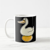 gans met gouden eieren koffiemok (Links)