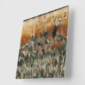 Ganzen en eenden lopen rond kunst vierkante klok (Hoek)