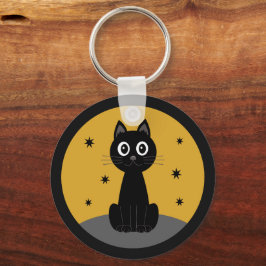 Gato negro sentado viendo las estrellas sleutelhanger