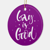 Gay is goed keramisch ornament (Links)