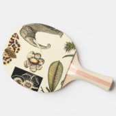 Geabsorbeerde dieren gekleurd op de achtergrond va tafeltennisbatje (Zijkant)