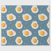 Gebakken eieren op blauw cadeaupapier (Vlak)