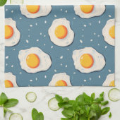 Gebakken eieren op blauw theedoek (Gevouwen)