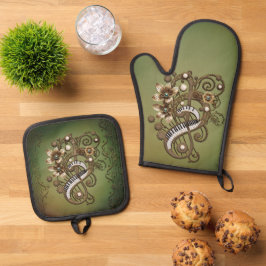 Gebogen steampunk piano keyboard. ovenwant & pannenlap set