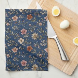 Geborduurde gewone wilde bloemen op denim achtergr theedoek