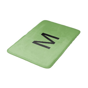 Geborduurde groene badmat met pistache-kleur