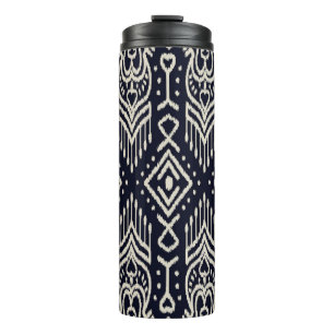 Geborduurde Ikat stof: etnische elegantie. Thermosbeker