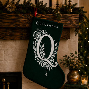 Gebreide kerstsok met botanisch monogram Q Kleine Kerstsok