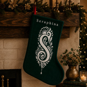 Gebreide sok met botanisch monogram in de letter S Kleine Kerstsok