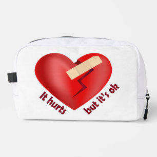 Gebroken hart geheeld met patch en levensspreuk toilettasje