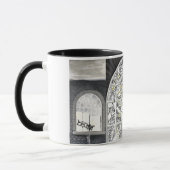 Gebroken, maar niet verbrijzelde zwarte behandelde mok (Links)