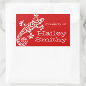 Gecko-boek bord: rode witte sticker met etiket op  (Tas)