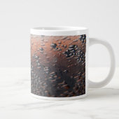 Gecondenseerde waterdruppels grote koffiekop (Rechts)