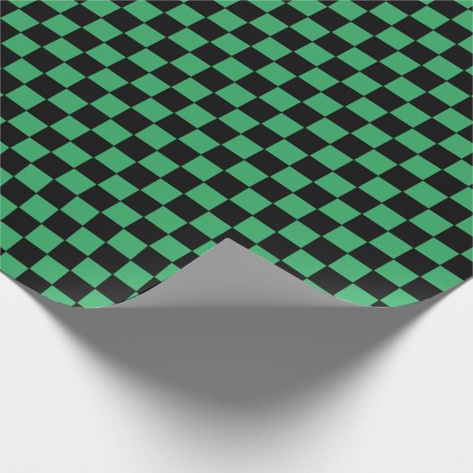 Gecontroleerd groen en zwart cadeaupapier (Hoek)