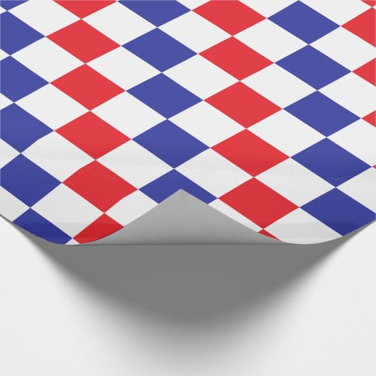 Gecontroleerd rood, wit en blauw cadeaupapier (Hoek)