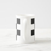 Gecontroleerd zwart-wit porselein kop (Achterkant)