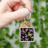 GECONTROLEERDE BUTTERFLIES SLEUTELHANGER (Hand)