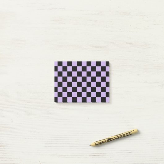 Gecontroleerde lavender en zwart post-it® notes (Op bureau)