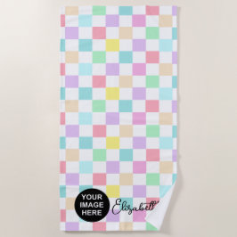 Gecontroleerde pastkleuren voor logo en naam strandlaken