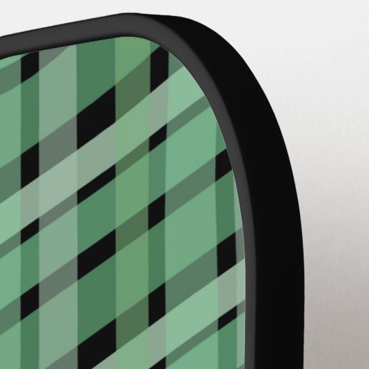 Gecontroleerde tartan groene strepen op zwart pickleball paddle (Links Detail)
