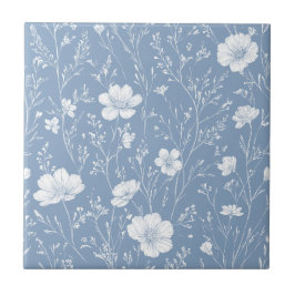 Gedempeld blauw en wit wildbloemenpatroon tegeltje