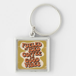 Gedreven door ijskoude koffie en goede vibes sleutelhanger