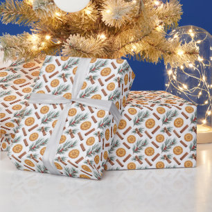 Gedroogde sinaasappels kaneelstokjes dennen takken cadeaupapier