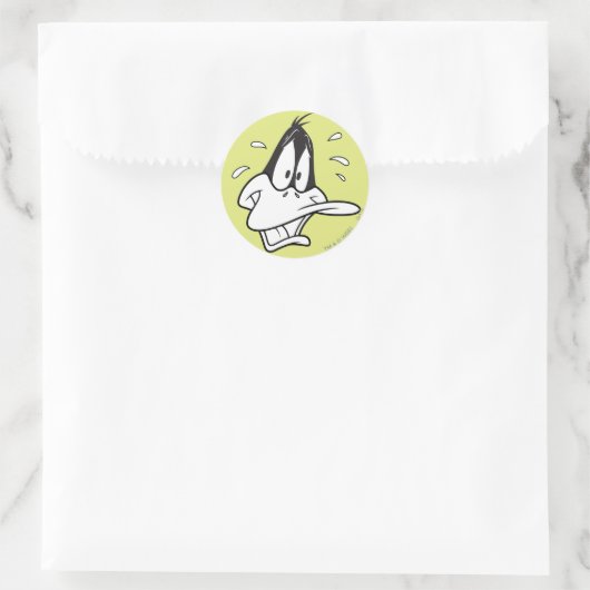 GEDRUKTE DAFFY DUCK™ RONDE STICKER (Tas)