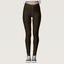 GEDRUKTE LEGGINGS ZWARTE MET ORANJE POLKA DOTS