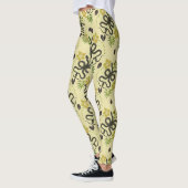 Gedrukte slangen en bloemen leggings (Links)
