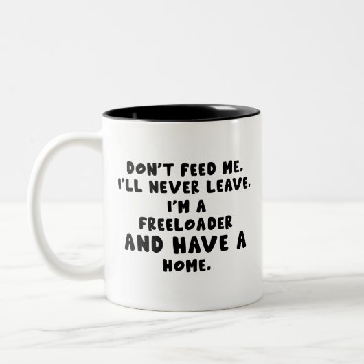 Geef me geen eten Ik ga nooit weg Ik ben een klapl Tweekleurige Koffiemok (Links)