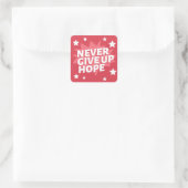 GEEF NOOIT HOOP VIERKANTE STICKER (Tas)