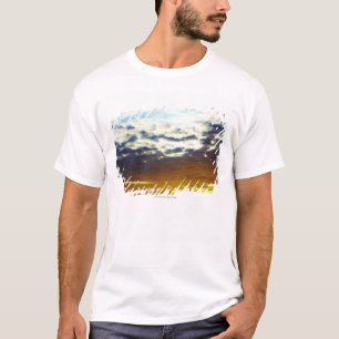 Geel blauw Moody Sunset met wolken T-shirt