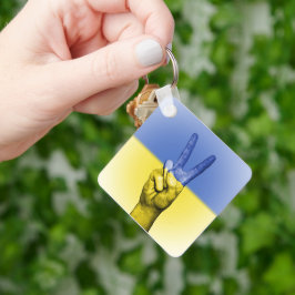 Geel en blauw vredesbord sleutelhanger