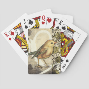 Geel en groen vogel op  achtergrond pokerkaarten